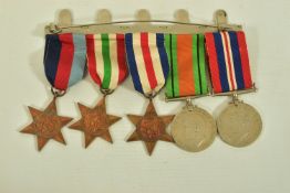WORLD WAR II Medals, 1939-45, Italy, France & Germany Stars, Defence & War Medals, on a wearing bar,