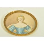 A LATE VICTORIAN MINIATURE PORTRAIT, depicting an elegant lady painted on ivory, within a base metal