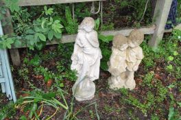 TWO MODERN COMPOSITE GARDEN FIGURES, one of a scantily clad maiden height 70cm and the other of a