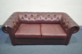A BURGUNDY LEATHERETTE CHESTERFIELD SOFA BED, length 180cm x depth 83cm x height 66cm (condition:-