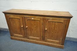 A 19TH CENTURY PITCH PINE THREE DOOR HOUSEKEEPER CUPBOARD, width 189cm x depth 48cm x height