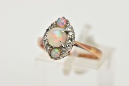 A ROSE METAL OPAL AND DIAMOND RING, a navette shaped cluster ring, set with three circular opals and