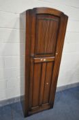 A SLIM OAK HALL CUPBOARD, width 61cm x depth 40cm x height 181cm (key) (condition:-surface scratches