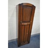 A SLIM OAK HALL CUPBOARD, width 61cm x depth 40cm x height 181cm (key) (condition:-surface scratches