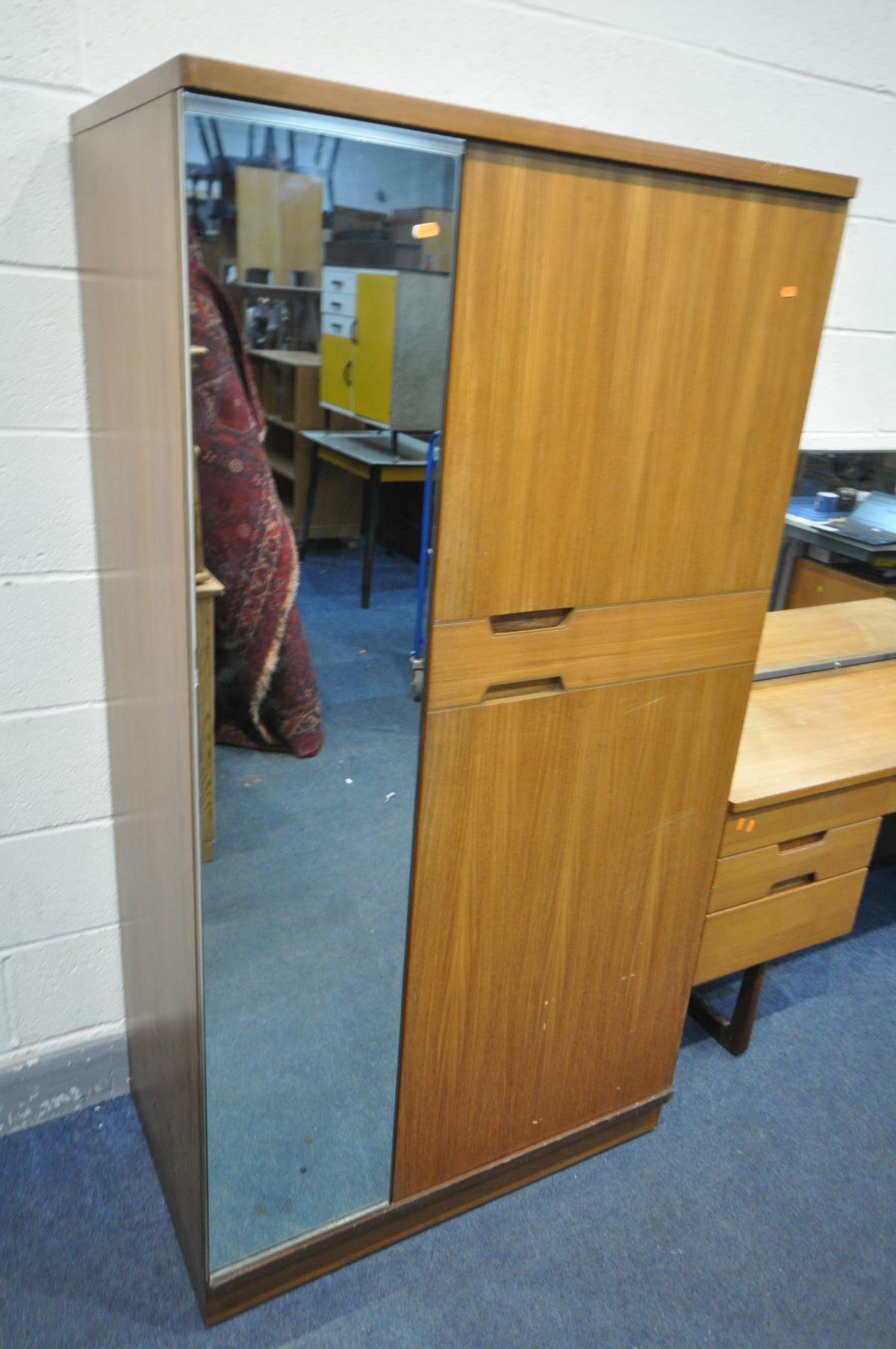 A MID-CENTURY UNIFLEX TEAK TWO PIECE BEDROOM SUITE, comprising a dressing table with a triple mirror - Image 3 of 4