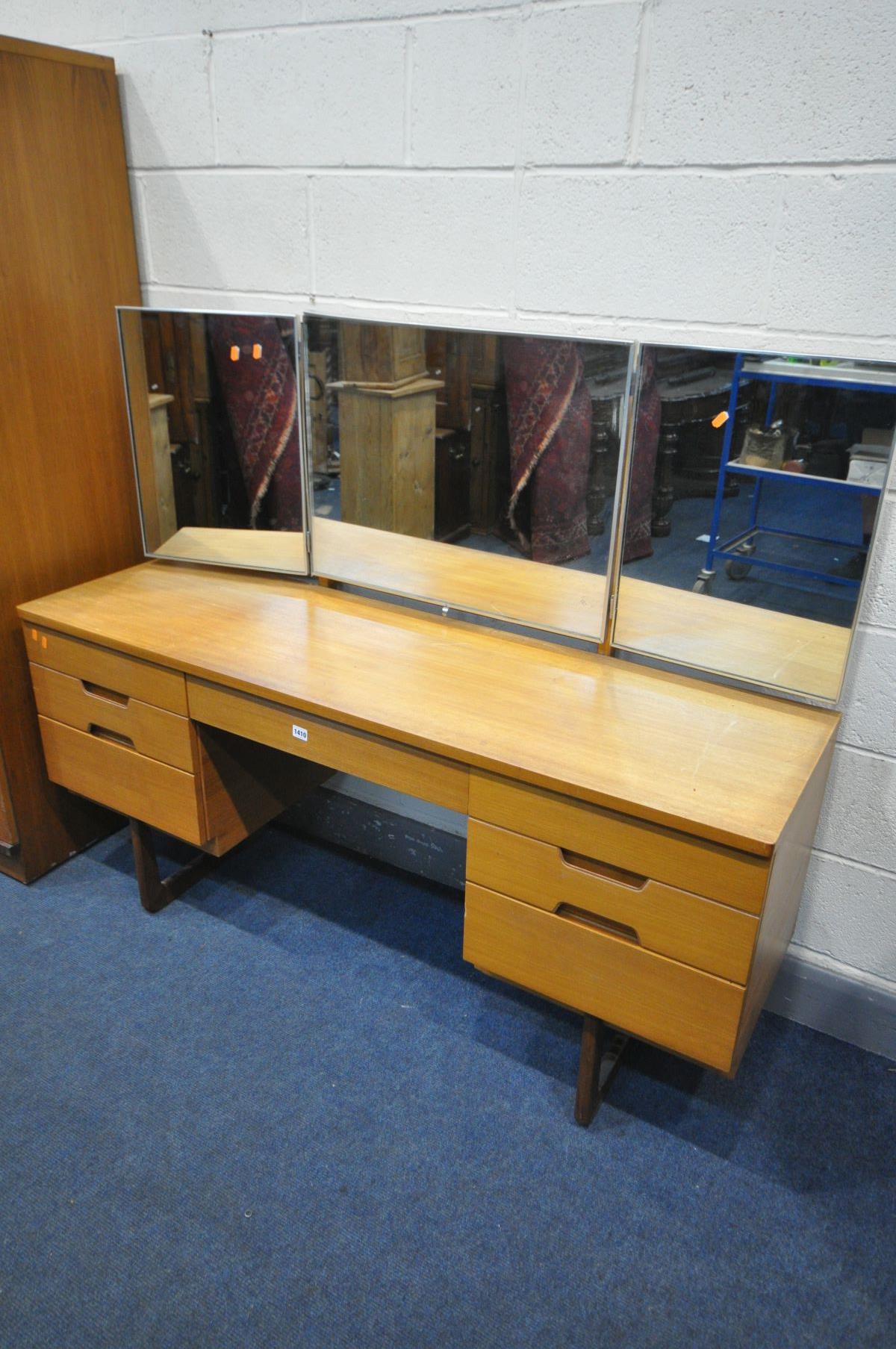 A MID-CENTURY UNIFLEX TEAK TWO PIECE BEDROOM SUITE, comprising a dressing table with a triple mirror - Image 2 of 4