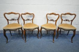 A SET OF FOUR VICTORIAN ROSEWOOD DINING CHAIRS, with scrolled and single bar back, with gold