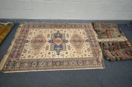 THREE VARIOUS VISCOSE CHIRAZ RUGS, comprising a beige ground rug, length 205cm x width 140cm, two