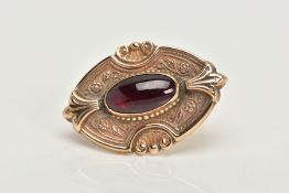 A 9CT GOLD GARNET BROOCH, a rose gold Victorian style brooch, set with an elongated oval garnet,