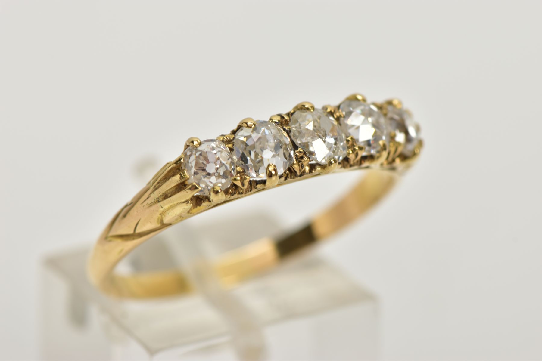 A YELLOW METAL FIVE STONE DIAMOND RING, designed with a row of five old cut diamonds, estimated - Image 4 of 4