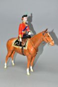 A BESWICK H.M. QUEEN ELIZABETH II ON IMPERIAL TROOPING THE COLOUR 1957, model no.1546, chestnut