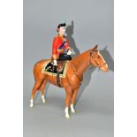 A BESWICK H.M. QUEEN ELIZABETH II ON IMPERIAL TROOPING THE COLOUR 1957, model no.1546, chestnut