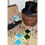 A SMALL DISTRESSED TOP HAT AND LEATHER CASE, together with a small box of reclaimed tiles