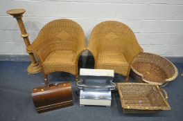 A PAIR OF WICKER ARMCHAIRS, a wicker pet basket, another basket, an oak cased singer sewing machine,