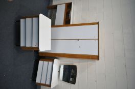 A HOMEWORTHY TEAK AND FOMICA BEDROOM SUITE, comprising a double door wardrobe, width 94cm x depth