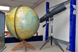 A TABLE GLOBE AND A SPOTTING SCOPE WITH TRIPOD, comprising a George Philip & Son Ltd Worldmaster