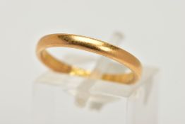 A 22CT GOLD BAND RING, a plain polished courted band ring, approximate width 2mm, hallmark part worn