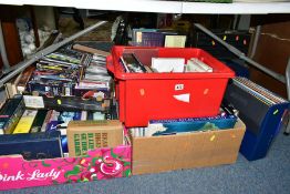 TEN BOXES OF BOOKS, RECORDS, CDS, DVDS AND VHS TAPES, over one hundred books with titles to