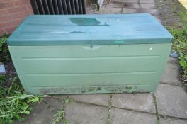 A GREEN PLASTIC GARDEN STORAGE BOX, width 120cm x depth 53cm x height 61cm together with a metal