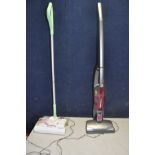 A SILVER CREST 12V CORDLESS VACUUM CLEANER with charging station and power supply and a G Tec