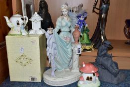 A GROUP OF ASSORTED CERAMIC AND RESIN FIGURES, THREE COALPORT COTTAGES, ETC, including two