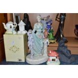 A GROUP OF ASSORTED CERAMIC AND RESIN FIGURES, THREE COALPORT COTTAGES, ETC, including two