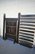 A GEORGIAN AND LATER OAK SINGLE BEDSTEAD, the headboard has various panelling, and later stained