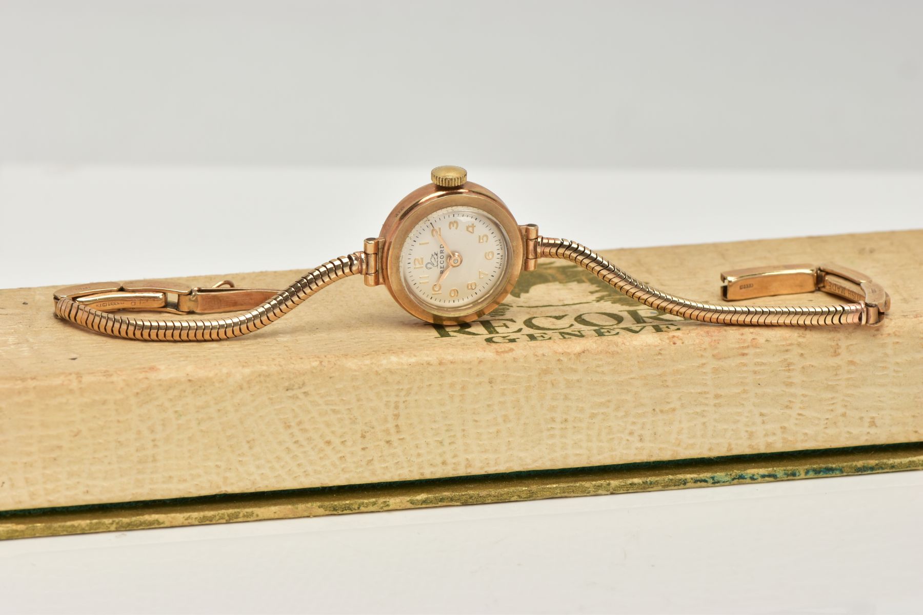 A 9CT GOLD LADIES WRISTWATCH, a hand wound movement, round white dial signed 'Record', Arabic - Image 3 of 6