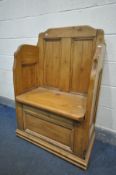 A BESPOKE PINE HALL SETTLE, constructed from 19th century doors, with a hinged lid, width 79cm x