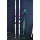 A PAIR OF J'A'RVINEN GUARTE 48 SKI'S along with a pair of Nova exel ski poles (4)