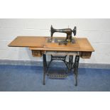 A VINTAGE SINGER TREDLE SEWING MACHINE, width 90cm x depth 44cm x height 78cm