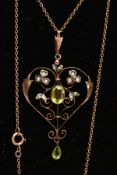 AN EARLY 20TH CENTURY 9CT GOLD LAVELIER NECKLACE, a rose gold open work heart shaped pendant,
