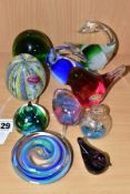 NINE SECOND HALF 20TH CENTURY GLASS PAPERWEIGHTS AND A DUTCH MINIATURE SHIP IN A BAUBLE, height 5.