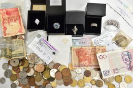 FOUR RINGS AND A SMALL QUANTITY OF COINS, to include a boxed white metal cluster ring set with