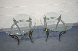 A PAIR OF CAST IRON CIRCULAR GLASS TOP OCCASIONAL TABLES, with swan head decoration to each leg,
