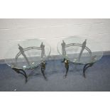 A PAIR OF CAST IRON CIRCULAR GLASS TOP OCCASIONAL TABLES, with swan head decoration to each leg,