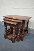 A SOLID OAK NEST OF THREE TABLES, largest table width 60cm x depth 33cm x height 46cm