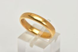A 22CT GOLD BAND RING, a plain polished courted band ring, approximate width 4mm, hallmarked 22ct