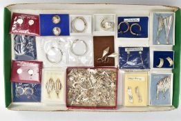 AN ASSORTMENT OF WHITE METAL JEWELLERY, to include a selection of packaged white metal earrings