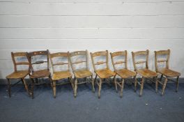 A HARLEQUIN SET OF SEVEN VICTORIAN OXFORD BAR BACK KITCHEN CHAIRS, with elm seats, comprising a
