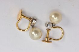 A PAIR OF YELLOW METAL EARRINGS, non-pierced screw back earrings each set with an old cut diamond in