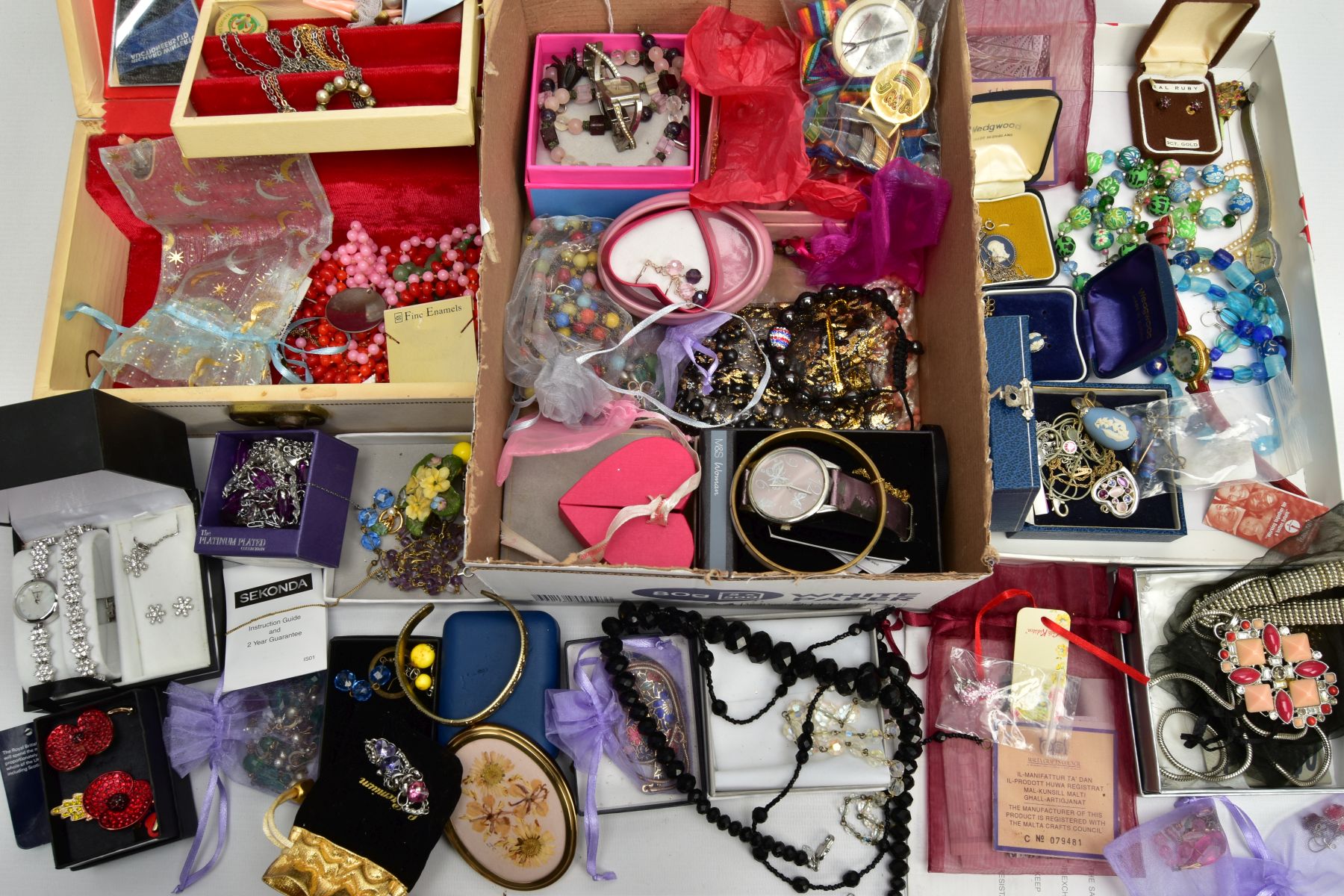 A BOX OF ASSORTED COSTUME JEWELLERY AND ITEMS, to include a small cream jewellery box with costume