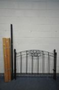 A WROUGHT IRON 5FT BEDSTEAD, with irons and pine slats