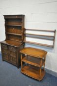 AN ERCOL GOLDEN DAWN TEA TROLLEY, on casters, width 72cm x depth 47cm x height 77cm, along with an