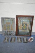 A PAIR OF LEAD GLAZED STAINED GLASS WINDOWS, one within mahogany frame, minus frame, 46cm x 67cm,