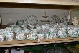 A ONE HUNDRED AND EIGHTY SEVEN PIECE MINTON HADDON HALL DINNER SERVICE, comprising fifteen dinner