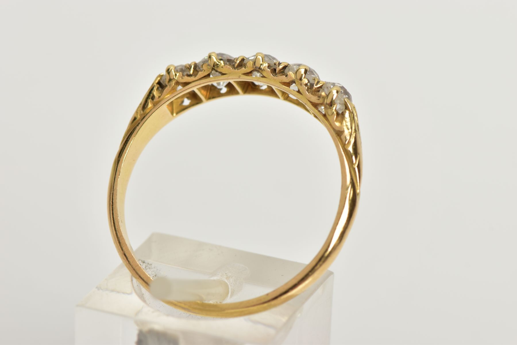 A YELLOW METAL FIVE STONE DIAMOND RING, designed with a row of five old cut diamonds, estimated - Image 3 of 4