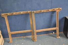 A PAIR OF INDUSTRIAL CAST IRON TABLE SUPPORTS depth 73cm height 81cm