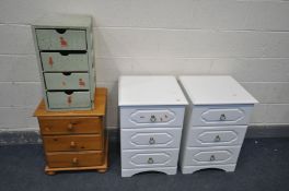 A PAIR OF WHITE FINISH THREE DRAWER BEDSIDE CABINETS, along with a pine three drawer bedside cabinet