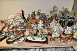 A QUANTITY OF FIGURINES AND DECORATIVE ORNAMENTS, approximately forty five pieces to include